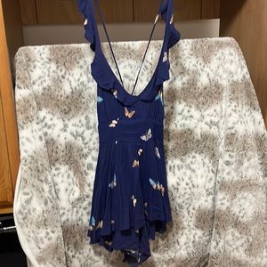 New with tag. Urban outfitters size small. romper. Blue. Butterflies.